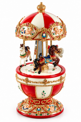 Carillon Natalizio Giostra con Cavalli EDG Enzo De Gasperi H 18,5 × Ø 8,5 cm, con cupola bianca e rossa, cavallini decorati e raffinate finiture dorate.