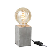 Lampada da tavolo in cemento grigio : Lampade di design in cemento - 93764