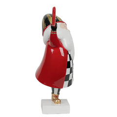 Babbo Natale in resina con cartello Merry Christmas vista laterale