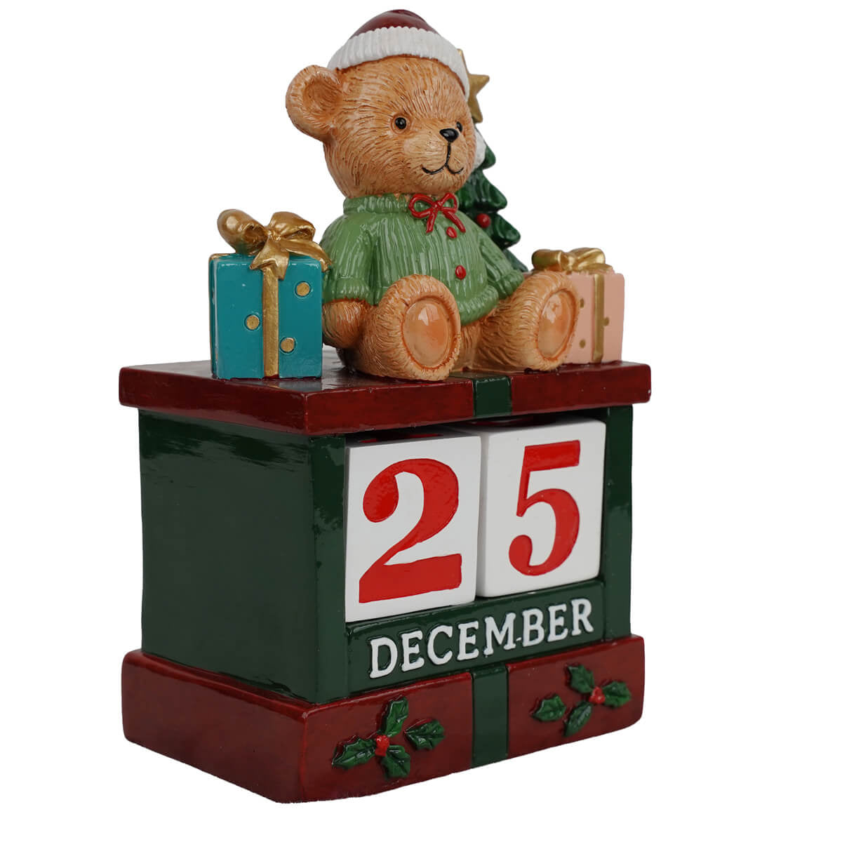 Vista laterale calendario natalizio con orsacchiotto, albero e pacchetti regalo in resina