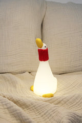 Lampada da notte Winkee Goose Snuggle oca accesa
