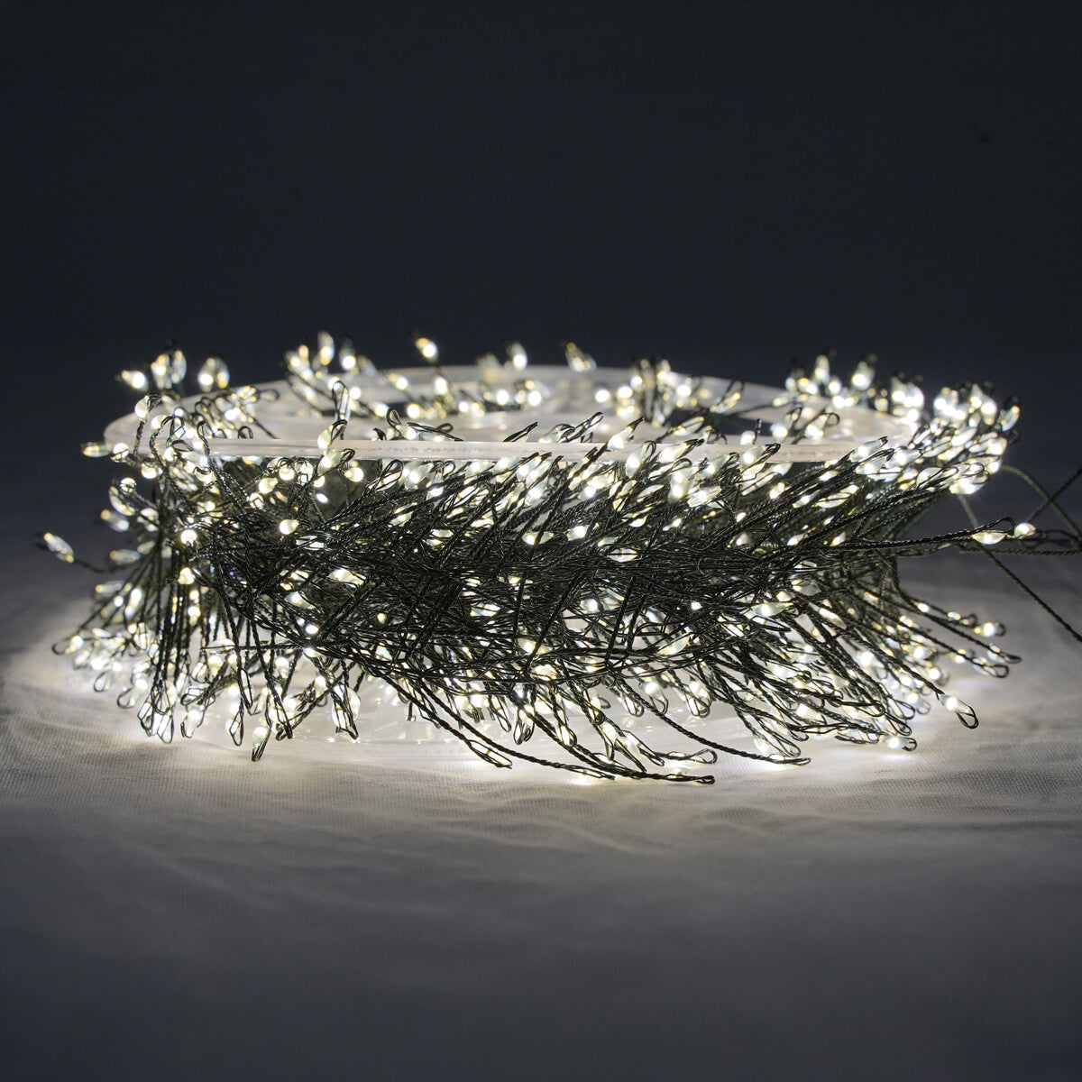 Stringa Cluster 25 m 2500 LED bianco naturale con rocchetto avvolgicavo