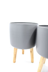 Vaso in metallo grigio su piedi in legno  - CONFIG0172